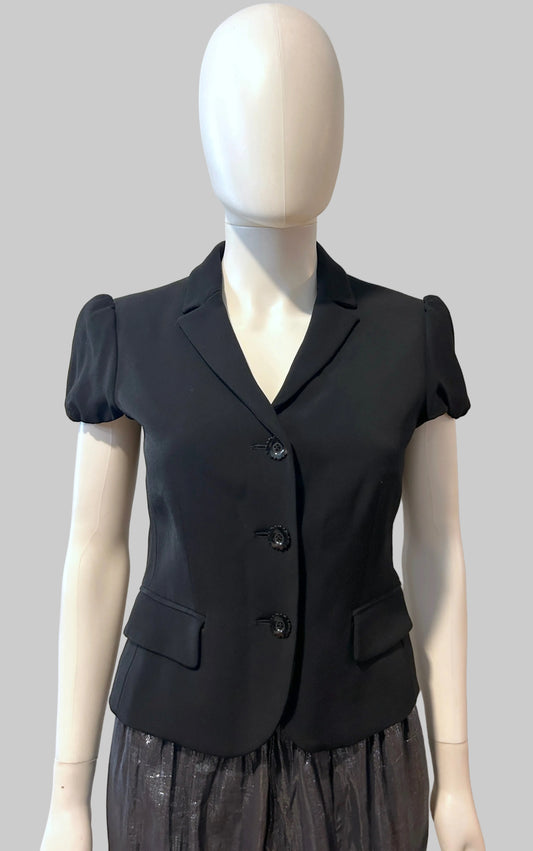 Moschino Cheap and Chic blazer in size 8, tailored women's clothing with a stylish, fitted design and classic lapel collar.