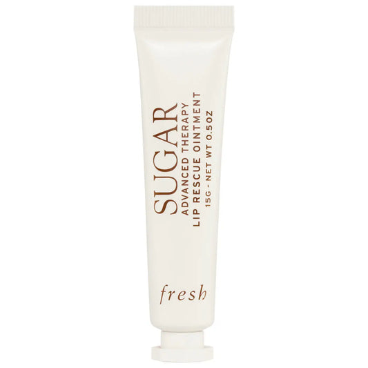 Fresh Sugar Advanced Therapy Lip Rescue Ointment jar with a clear lid, showcasing the nourishing lip treatment for dry lips.