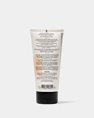 SEEN Curly Creme 6oz for curly hair, scented beauty cream in a white jar with a black lid, shown from the back.