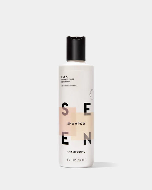 SEEN Shampoo 8.6oz bottle with scented label, front view showcasing the clear product and sleek packaging design.