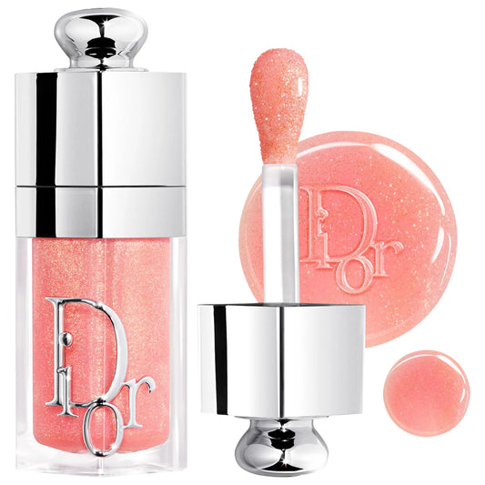 Dior Lip Glow Oil hydrating high-shine gloss in three finishes, displayed in a sleek tube with a shiny applicator.