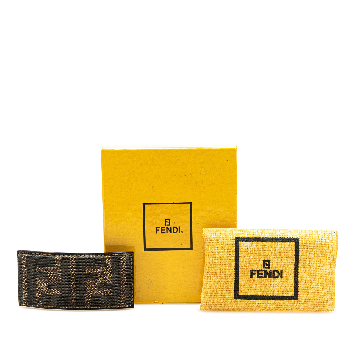 Fendi Zucca canvas barrette hair clip with Fendi logo detail, stylish accessories for hair styling and fashion.