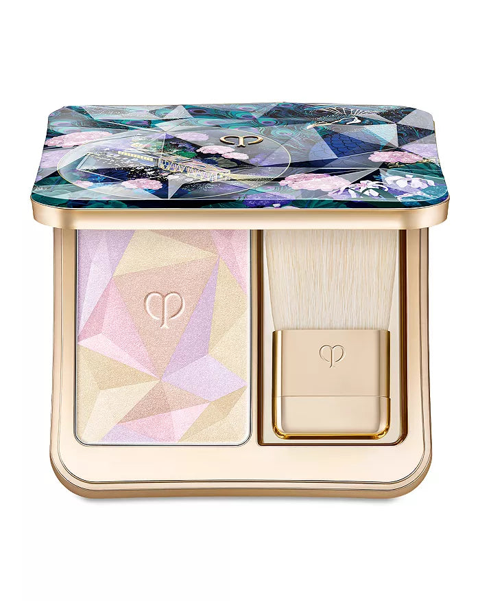 Fresh unopened Clé De Peau Beauté The Lumizing Face Enhancer in shade 110, featuring sleek packaging and elegant design.