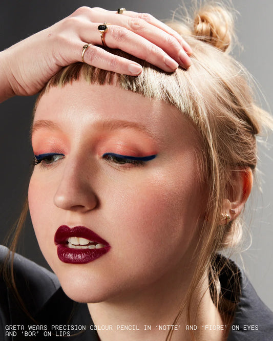 19/99 Precision Colour Pencil in Fiore NIB, shown in use on face with vibrant, all-over face colour application.