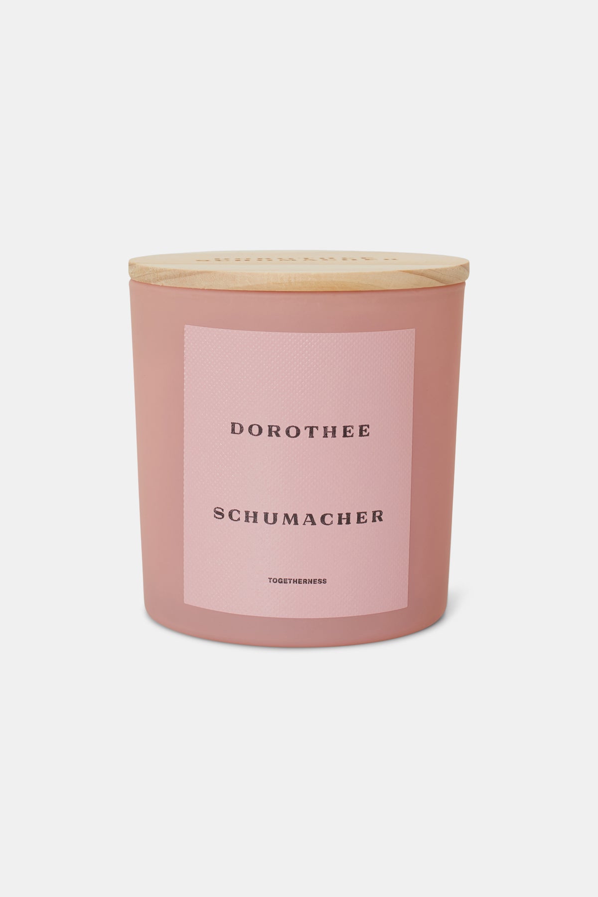 Dorothee Schumacher Togetherness Candle in 230g jar, elegant home décor candle with subtle branding and a minimalist design.