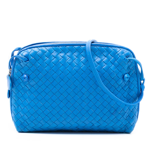 Bottega Veneta Nappa Intrecciato Nodini crossbody bag with woven leather design and sleek shape.