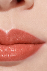 Chanel Rouge Coco Flash lipsticks in various shades, new in box, featuring sleek packaging and vibrant color options.