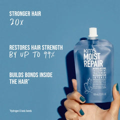 KMS Moist Repair Intense Restore Treatment pouch 100ml, a beauty product with nourishing formula and sleek packaging.