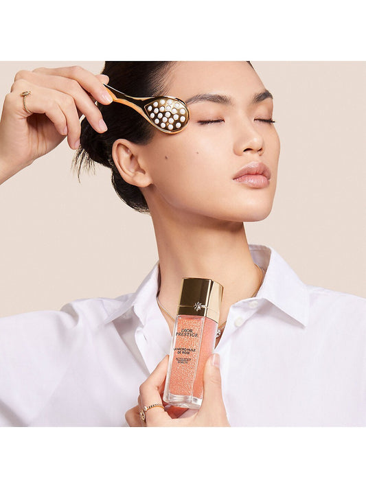 Dior Prestige La Micro-Huile de Rose activated serum 50ml and Prestige Le Pétale massage tool set for skincare.