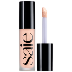 Saie Slip Tint Radiant All-Over Concealer in multiple shades, new in box, with sleek packaging and applicator visible.