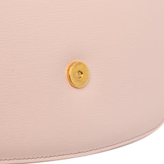 Tom Ford pink calfskin Lock crossbody bag with sleek design and adjustable strap, perfect for stylish everyday use.
