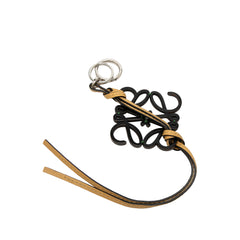 Green LOEWE leather Anagram key ring and bag charm with branded logo details, stylish accessory for keys and bags.
