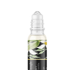 A Pleasant Thought Gatsby tobacco and vanilla perfume oil bottle with a sleek design, showcasing the beauty product.