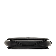 Black Celine trifold leather clutch on chain with sleek design, featuring multiple compartments and elegant craftsmanship.