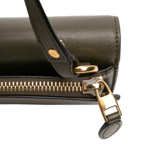 Alexander McQueen mini leather skull lock top handle bag in green, featuring a distinctive skull design and elegant handbag style.