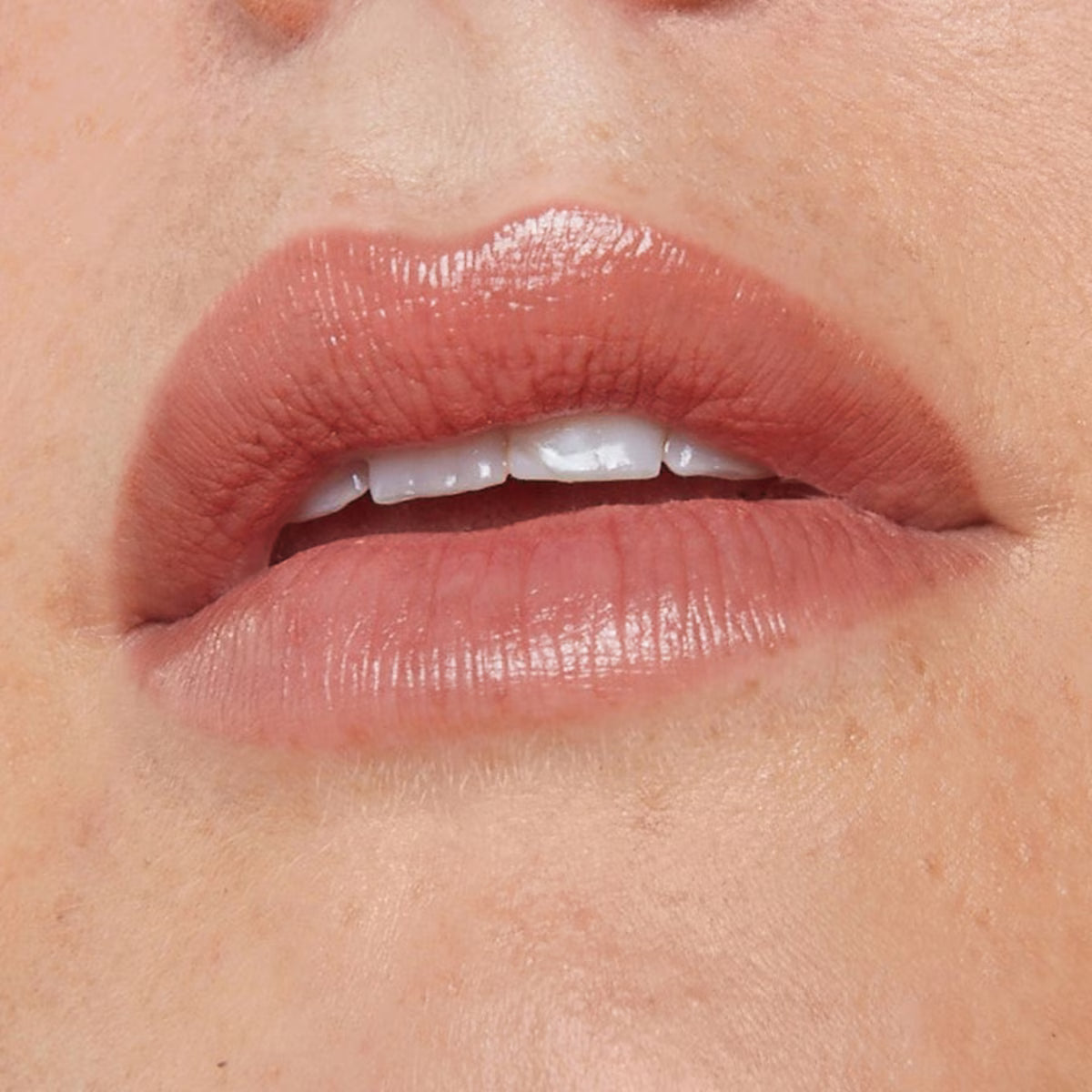 Nudestix Nudescreen Lip Primer SPF 30 in NWOB, close-up of the unopened primer tube with label visible.