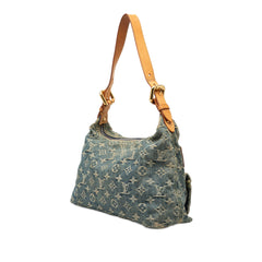 Louis Vuitton Monogram Denim Baggy PM bag with top handles and spacious interior, featuring signature LV monogram and denim fabric.
