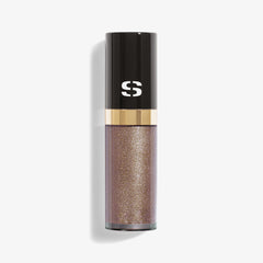 Sisley Ombre Eclat Liquide Stardust NIB liquid eyeshadow in a shimmering shade, displayed on a neutral background.