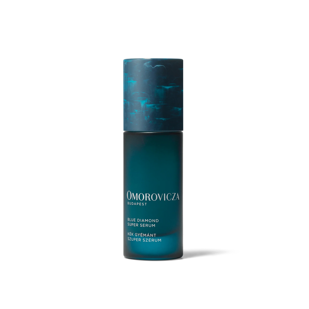 Omorovicza Blue Diamond Super Serum in 30ml bottle, featuring a sleek blue packaging and applicator for radiant skin.
