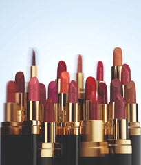 Chanel Rouge Coco Ultra Hydrating Lip Colour in various shades, featuring a sleek lipstick tube and vibrant color swatches.