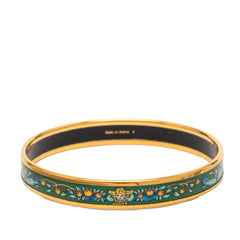 Hermès narrow enamel fruits cloisonné bangle jewelry featuring colorful fruit designs on a gold-tone bracelet.