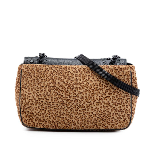 Bottega Veneta pony hair shoulder bag with leopard print pattern and leather strap, stylish and luxurious accessory.