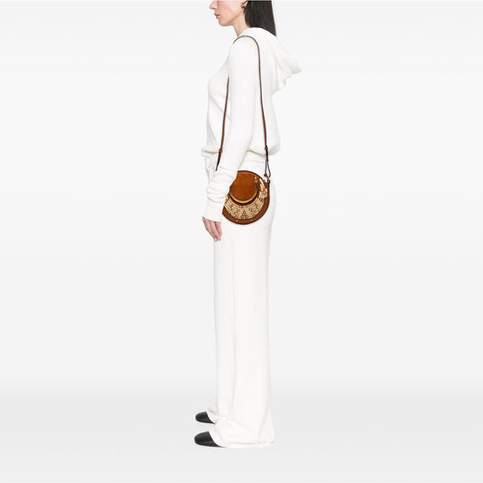 Chloé small suede and raffia Pixie satchel bag with top handle and woven raffia accents, stylish and compact for everyday use.