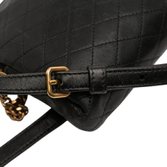 Black Saint Laurent mini quilted lambskin Gaby zippered pouch with gold-tone hardware, stylish and compact bag for essentials.