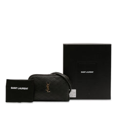 Black Saint Laurent mini quilted lambskin Gaby zippered pouch with gold-tone hardware, compact bag for essentials.