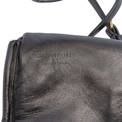 Black Saint Laurent mini quilted lambskin Gaby zippered pouch with gold-tone hardware, stylish designer bag for everyday use.