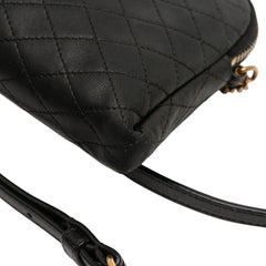 Black Saint Laurent mini quilted lambskin Gaby zippered pouch with gold-tone hardware, compact designer bag for essentials.