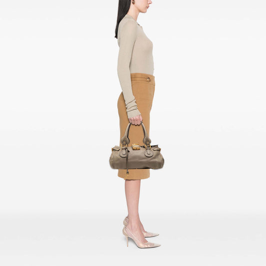 Chloé Medium Leather Paddington Handbag in tan with gold hardware, featuring double handles and a signature padlock detail.