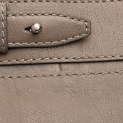 Brown Alexander Wang leather fold-over Adele clutch bag with sleek design and compact size.