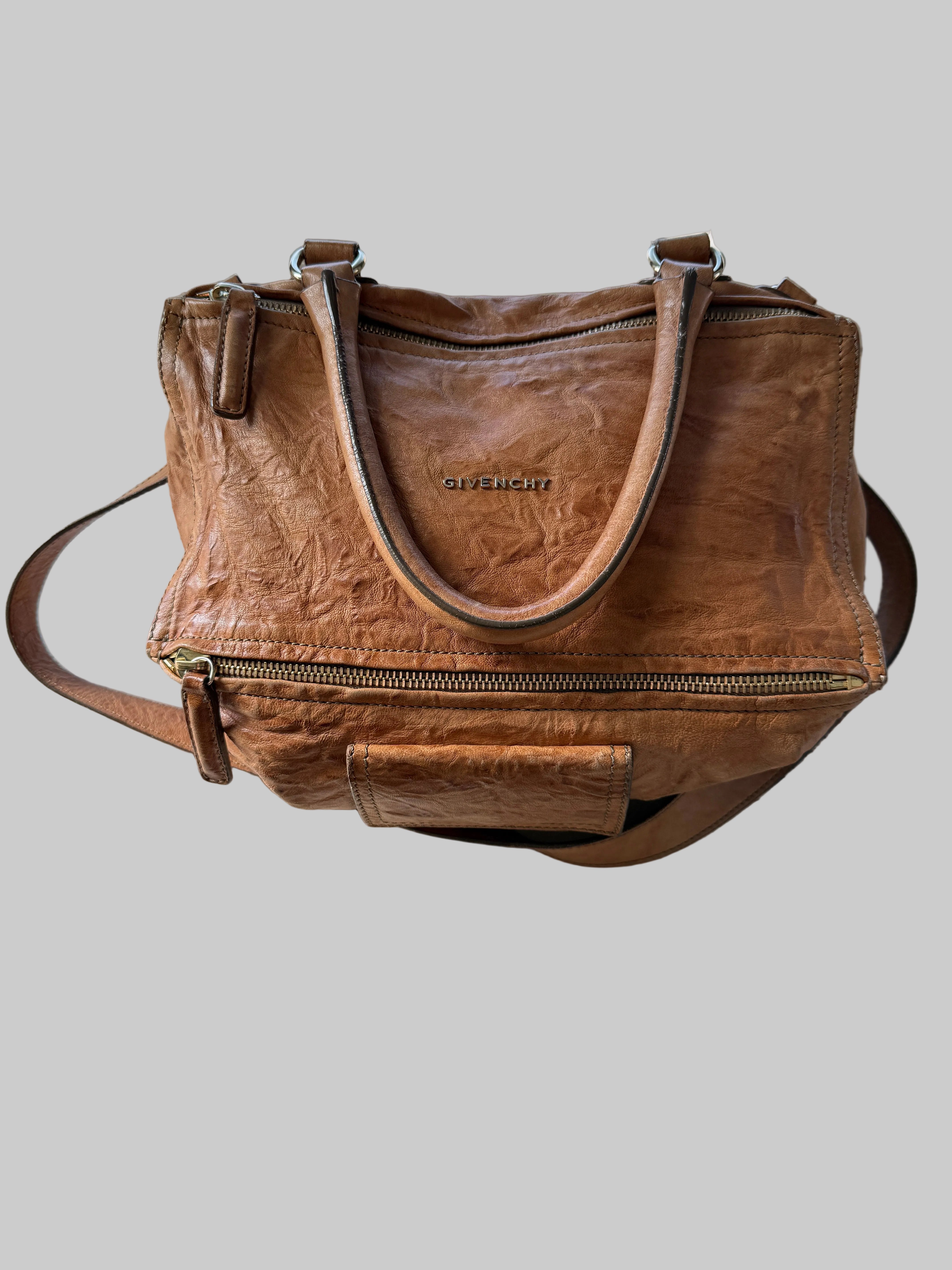 Givenchy large Pepe Tan Pandora bag with textured leather and gold-tone hardware, featuring top handles and a spacious interior.