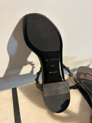 Balenciaga Arena sandals in size 35.5, featuring sleek design and premium materials, displayed on a neutral background.