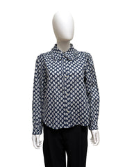 The Great Cotton Daisy Blouse, light blue with white floral print, featuring a relaxed fit and classic collar.