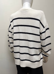 Jenni Kayne striped cardigan, soft knit fabric with horizontal beige and white stripes, long sleeves, and a relaxed fit.