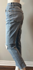 Re/Done 90s high-rise ankle crop jeans in size 28, showcasing light wash denim with distressed details and classic fit.