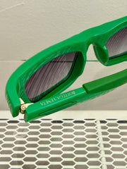 Bottega Veneta BV1182S-30013671-003 sunglasses with dark tinted lenses and sleek black frames.