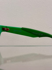 Bottega Veneta BV1182S sunglasses with dark tinted lenses and sleek black frames, stylish accessories for sun protection.