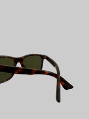 Gucci GG0746S 001 sunglasses with black frames and dark lenses, stylish accessories for sun protection and fashion.