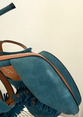Gucci Petroleum Teal suede fringed T-strap sandals in size 36.5, featuring a stylish design and T-strap construction.