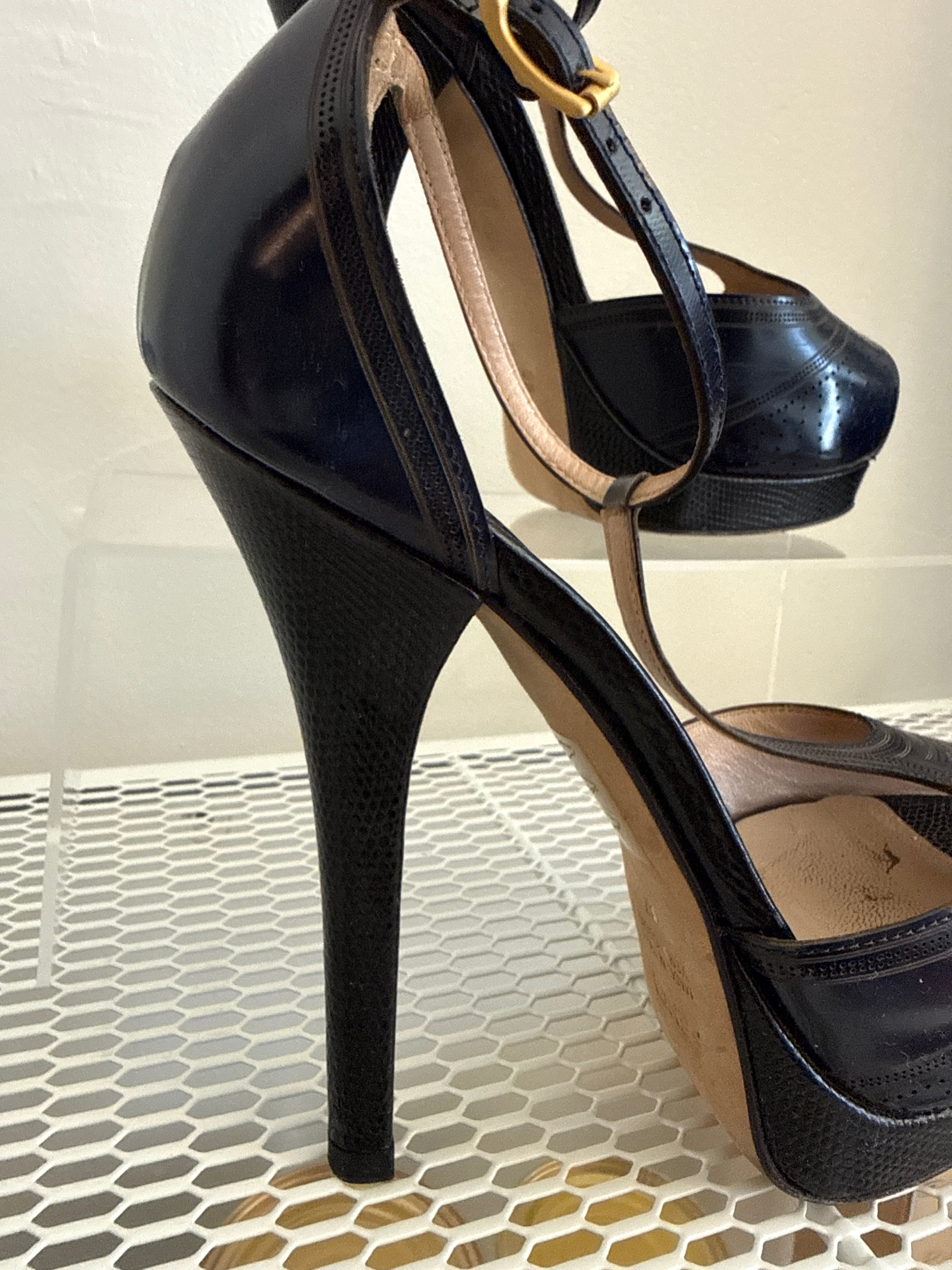 Fendi peep toe pumps in size 37, stylish black shoes with a sleek design and pointed toe, perfect for elegant occasions.