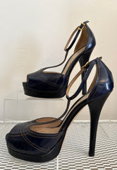 Fendi peep toe pumps in size 37, stylish shoes with a sleek design and pointed toe, perfect for elegant footwear.