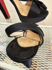 Christian Louboutin satin bow slingback disco noeu platform sandals size 37.5, featuring elegant satin bows and signature red soles.