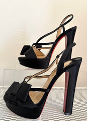 Christian Louboutin satin bow slingback disco noeud platform sandals size 37.5 with elegant design and signature red sole.