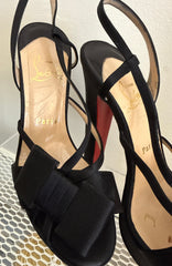 Christian Louboutin satin bow slingback disco Noeud platform sandals size 37.5 with red sole and elegant design.