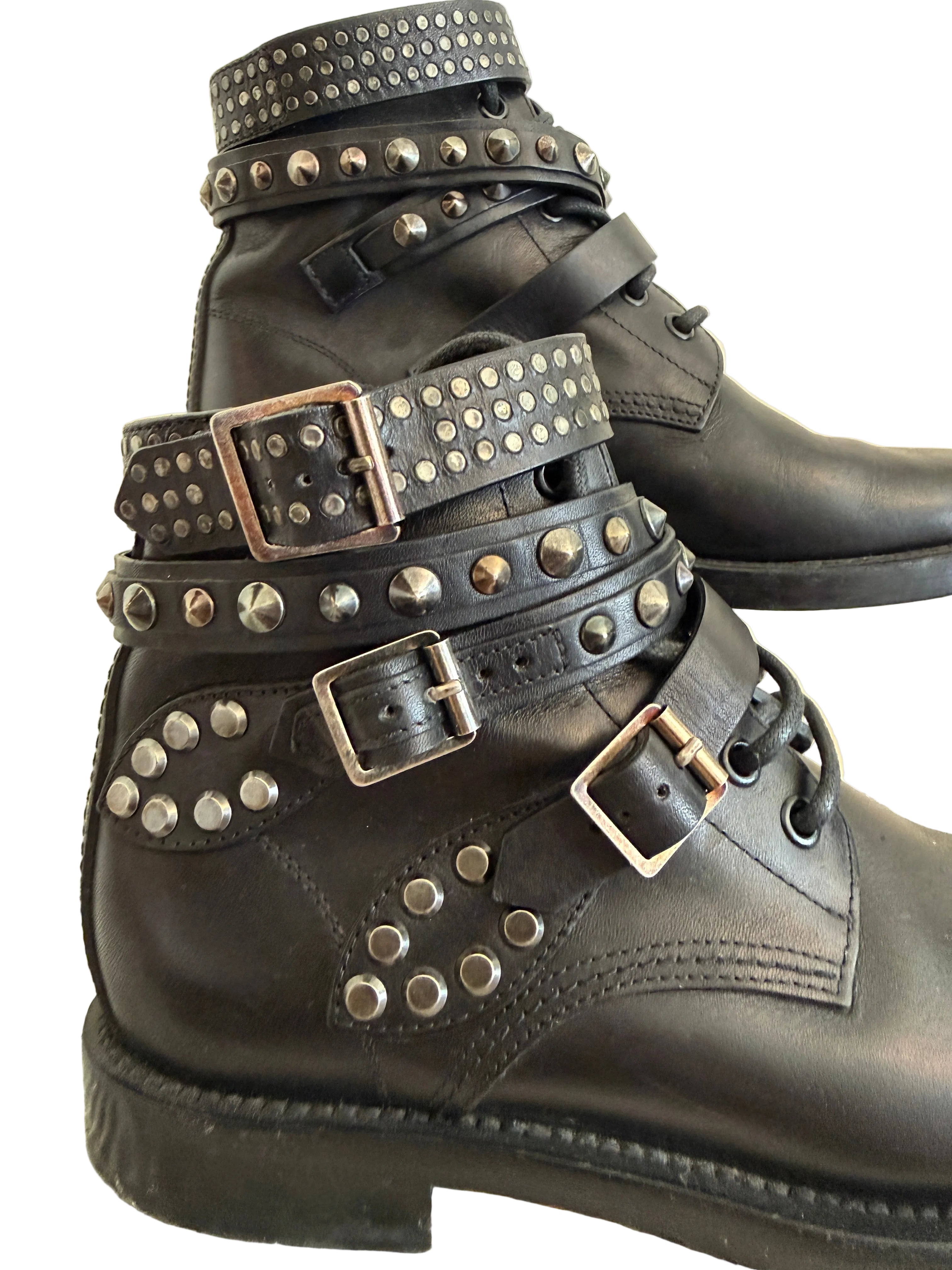 Yves Saint Laurent Ranger Stud Boot with wrap straps in size 37.5, showcasing black leather shoes with studded detailing.