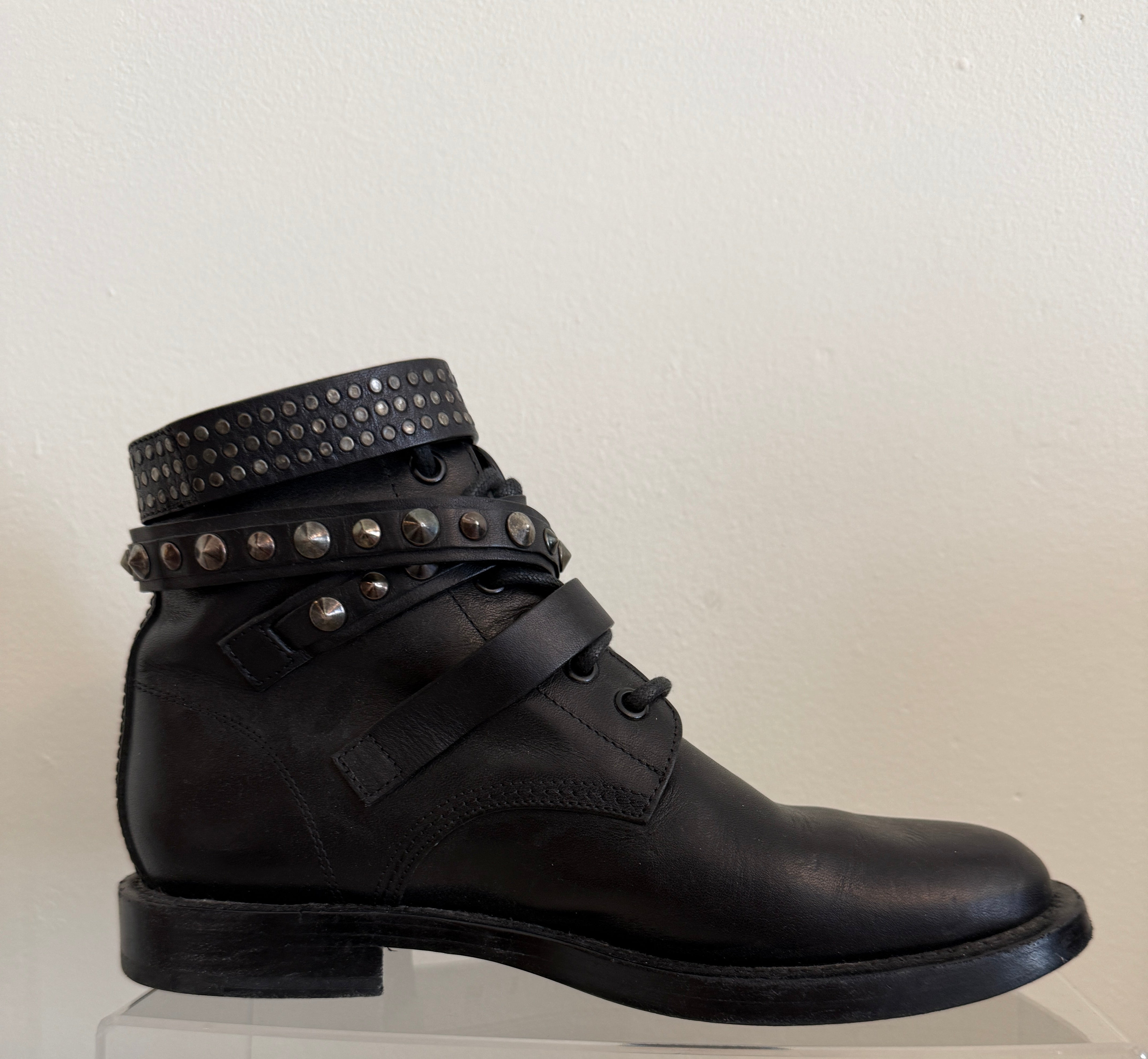 Yves Saint Laurent Ranger Stud Boot with wrap straps in size 37.5, black leather shoes with studded details.