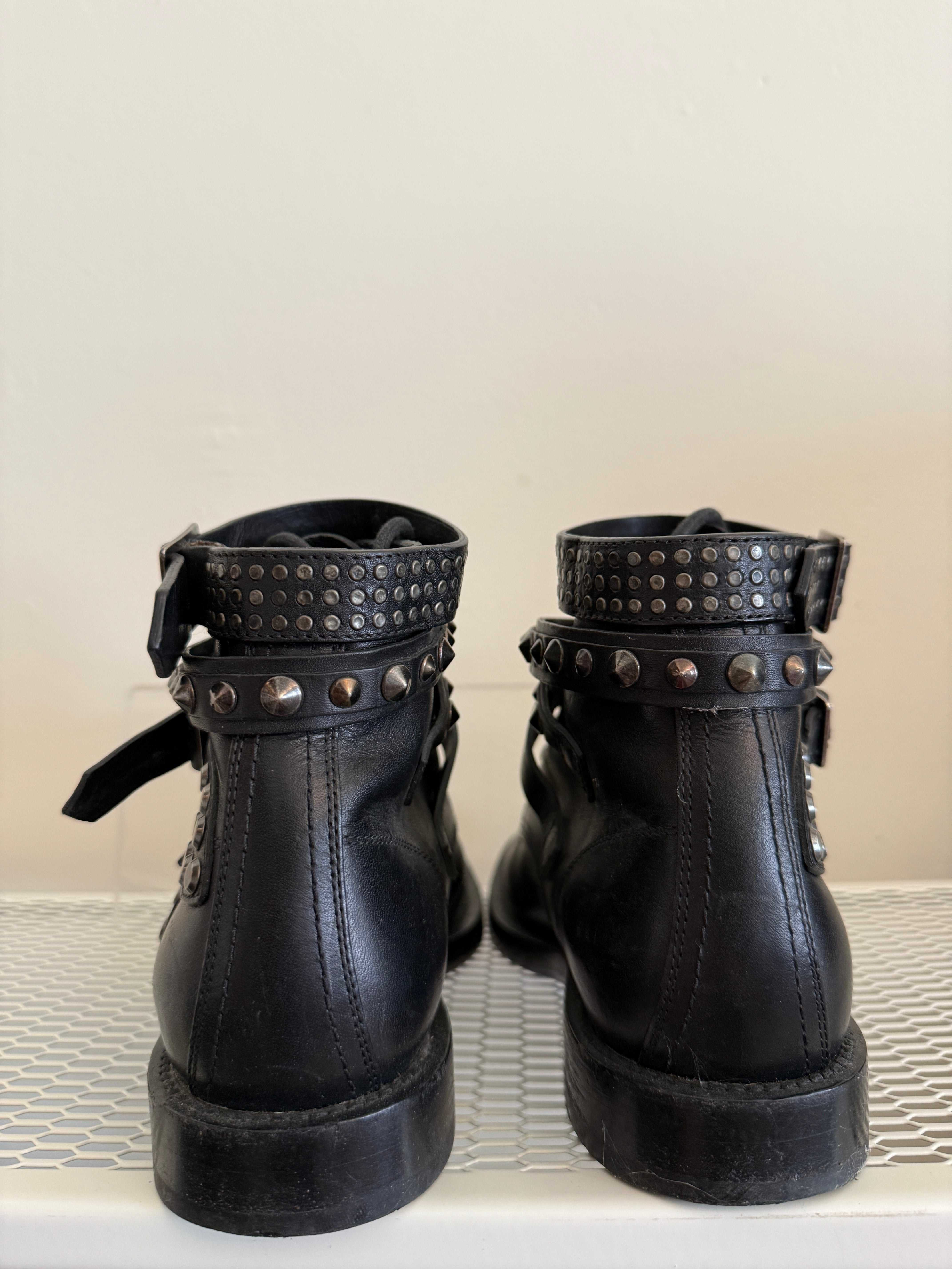 Yves Saint Laurent Ranger Stud Boot in size 37.5, featuring wrap straps and stud detailing, stylish high-heeled shoes.